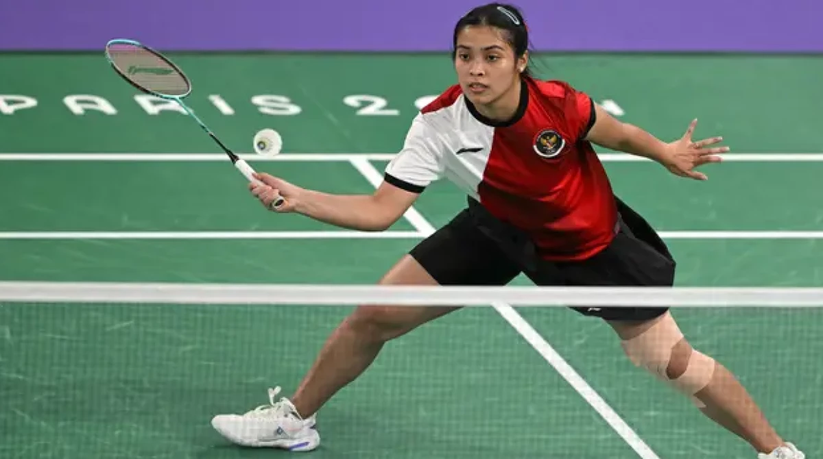 laga Grup G bulu tangkis Olimpiade Paris 2024 di Porte de la Chapelle Arena, Prancis, Minggu (28/7/2024). Gregoria Mariska Tunjung menang straight game 21-10, 21-15. (AFP/Arun Sankar)